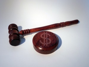 Regulatory Compliance Translation - Gavel with Money Sign