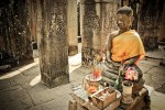 Khmer New Year - Buddha Statue with Offerings 