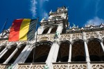 Belgian Patent Translation Requirements - Belgian Flag In Front of Brussels Grand Palace