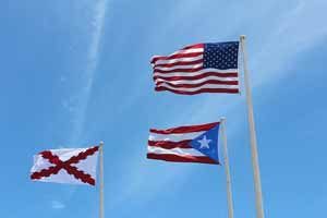 Puerto Rican Migration - Puerto Rican, Spanish, and US Flags