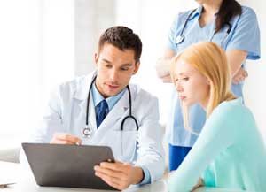 Patient Centric Healthcare - Male Doctor with Patient