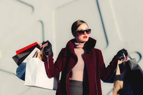 Untranslatable Spanish Words - Woman holding many shopping bags