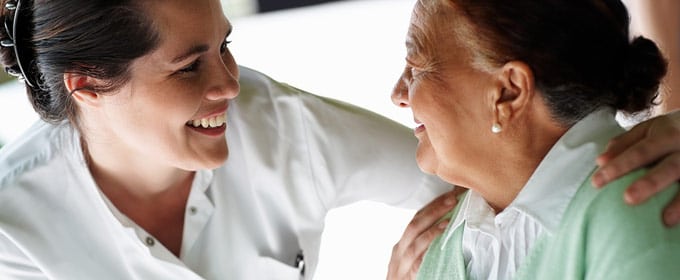 Patient Recruitment Challenges - Doctor Smiling at Patient