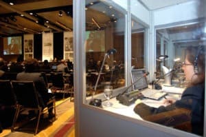 Multilingual Interpreting Services - Interpreters in Soundproof Booth
