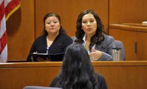 Immigration Trends 2016 - Woman Speaking in Courtroom