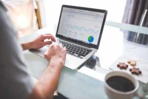 Multilingual SEO - Person on laptop looking at google analytics dashboard