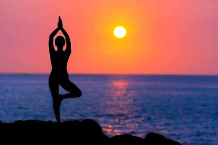 Haitian Creole Translation To English - Yoga on beach at sunset